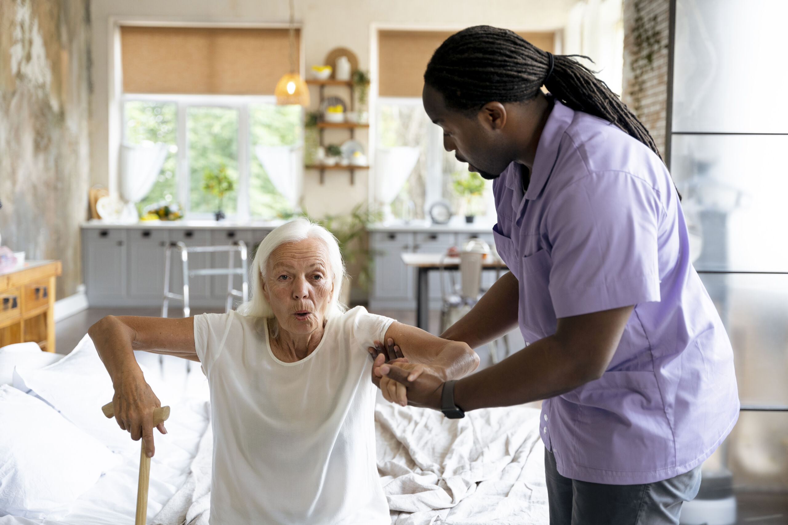 social-worker-taking-care-old-woman